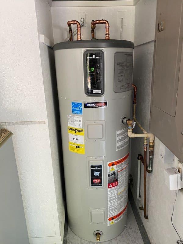 AeroStorm electric water heater installation in a residential utility room.