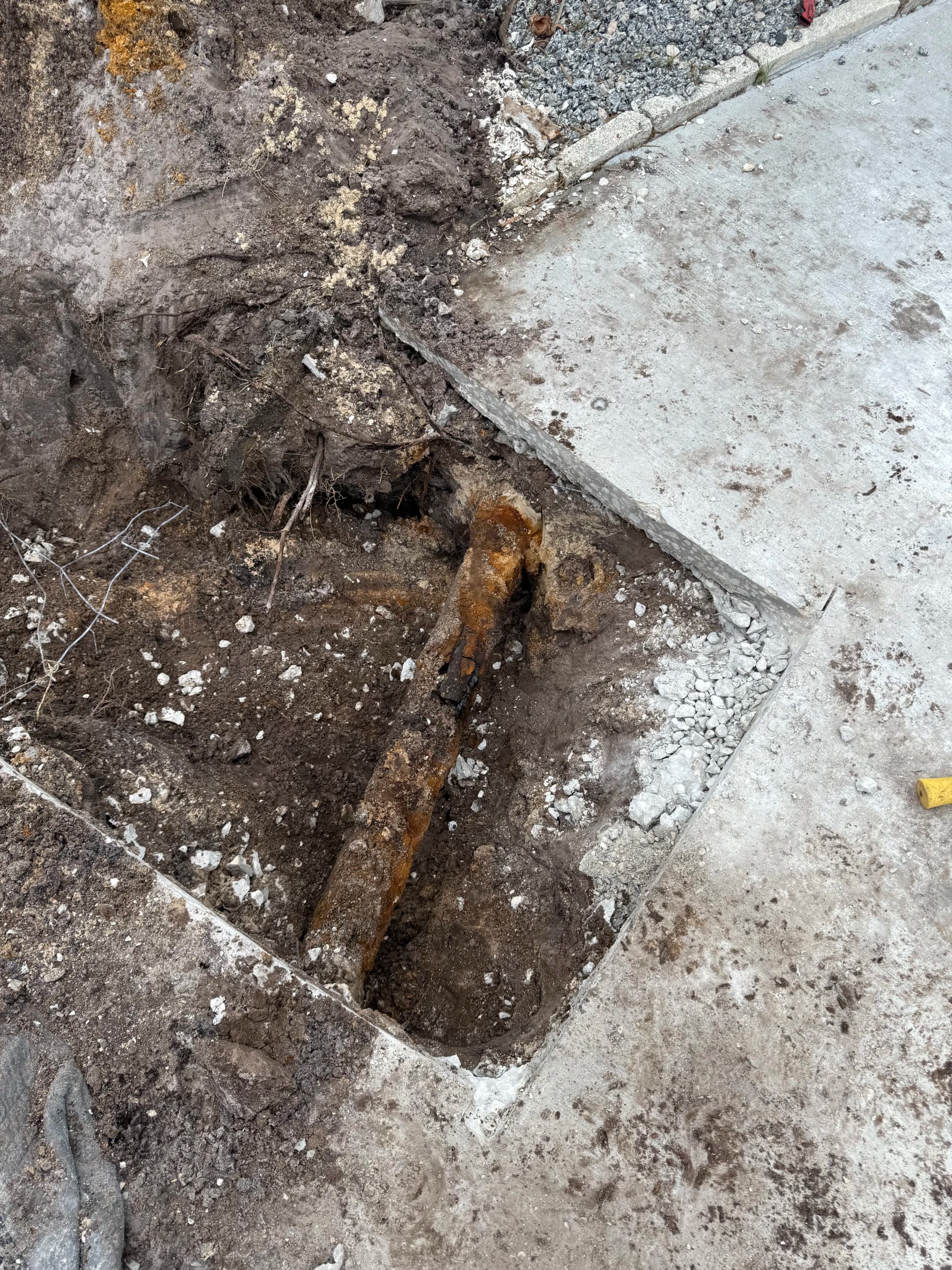 Gallery photos for Collapsed Cast Iron Sewer Line Fixed Under a Driveway: Image #1