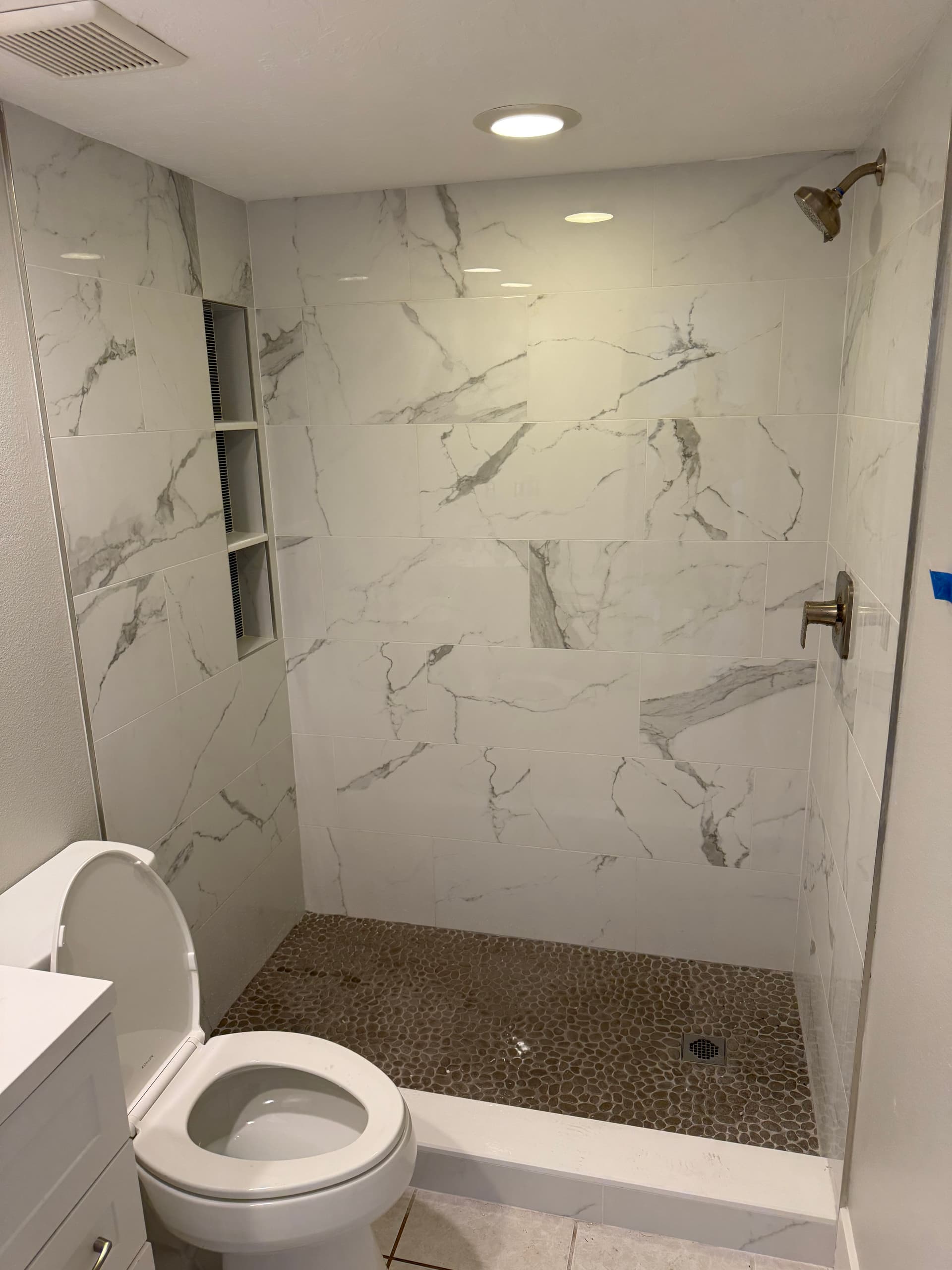 Gallery photos for Stylish Bathroom Upgrade with Modern Moen Fixtures: Image #5