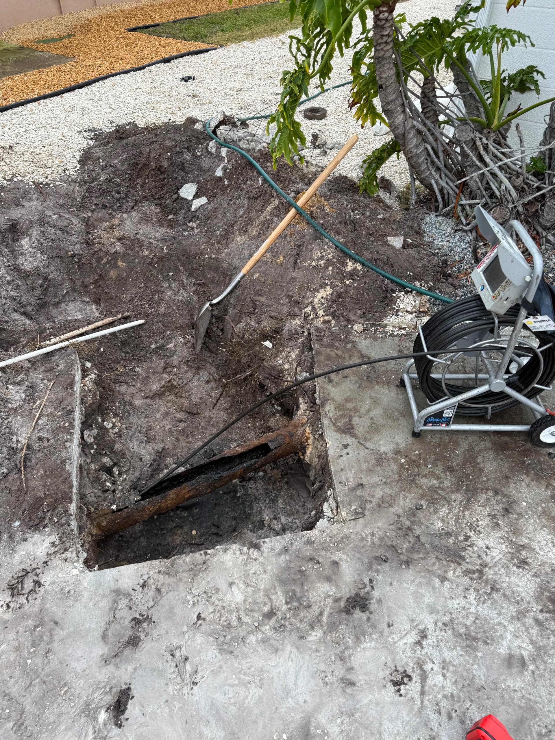 Gallery photos for Collapsed Cast Iron Sewer Line Fixed Under a Driveway: Image #2