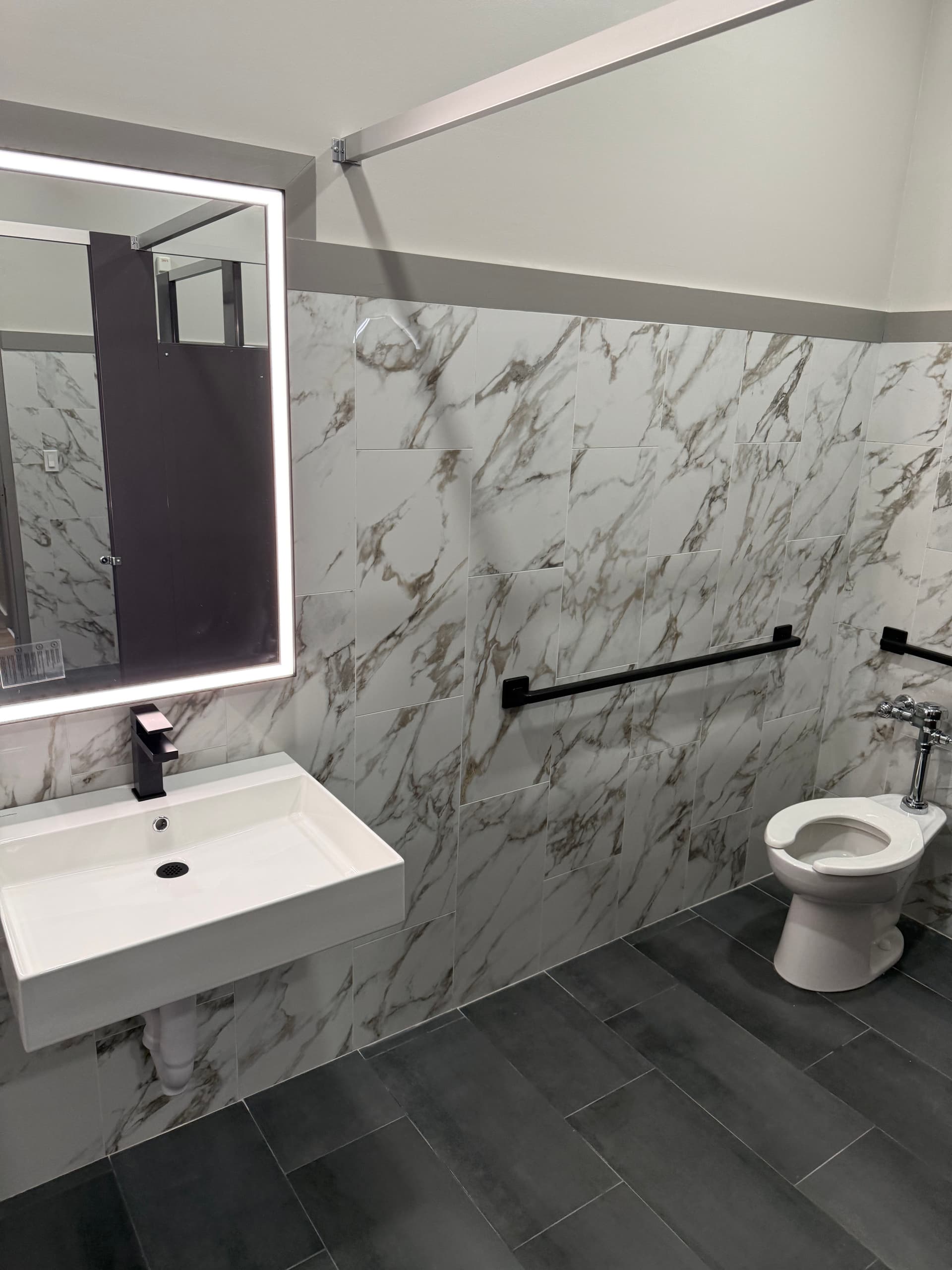 Commercial ADA Restroom Trim-Out with American Standard and Sloan Fixtures image