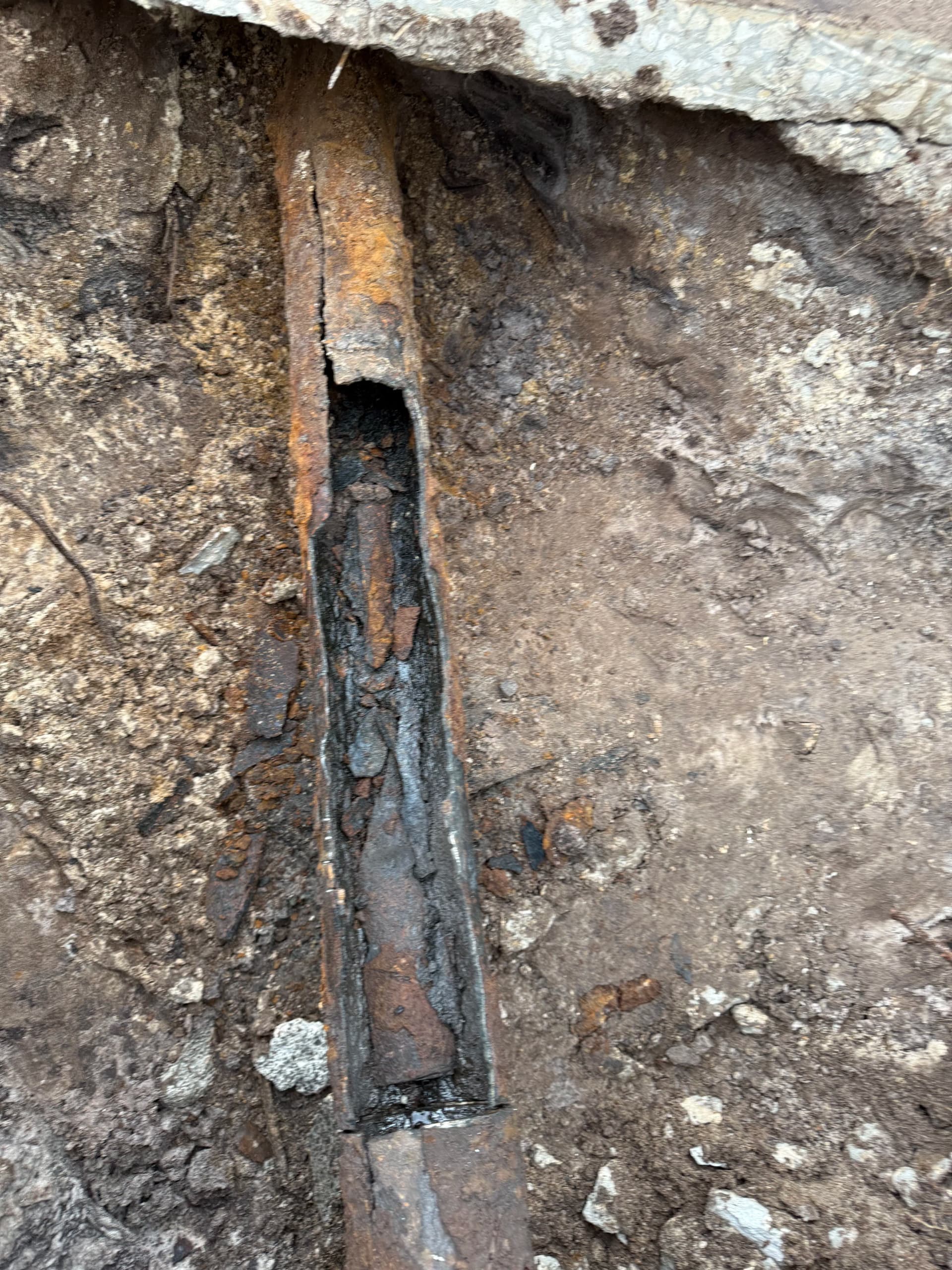 Gallery photos for Collapsed Cast Iron Sewer Line Fixed Under a Driveway: Image #3